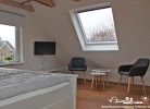 Schlafzimmer mit Doppelbett OG